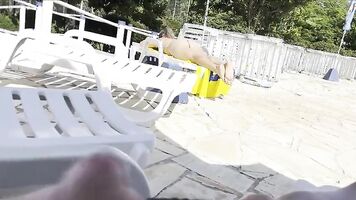 She noticed that I was jerking off and helped me cum right next to the public pool